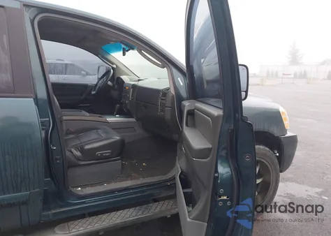 2005 Nissan Titan Le from USA, damaged, VIN 1N6AA07B05N564313